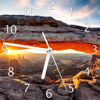 Wallario Design Wanduhr Sonnenstrahl am Horizont Leuchtende Felsspalte aus Echtglas, Größe 20 x 20 cm - Braun