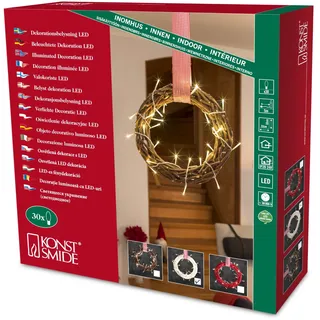 Konstsmide LED Holzsilhouette Kranz weiß, mit rot-weißem Stoffband, 30 warm weiße Dioden, 24V Innentrafo, transparentes Kabel - 6218-200 Türkranz Beleuchtung Warmweiß