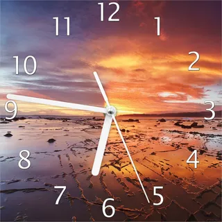 Wallario Design Wanduhr Wattwanderung am Meer bei Sonnenuntergang aus Echtglas, Größe 20 x 20 cm - Rot