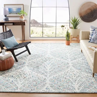 SAFAVIEH Modern Teppich für Wohnzimmer, Esszimmer, Schlafzimmer - Capri Collection, Kurzer Flor, Beige und Blau, 152 X 229 cm