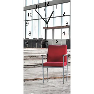 Wallario Design Wanduhr bedruckt, Größe 30 x 60 cm, Motiv: Stille und Leere - ein einsamer roter Stuhl in einer alten Halle - Blau