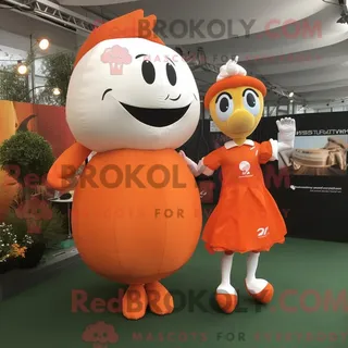 Maskottchen REDBROKOLY eines orangefarbenen Rugbyballs gekleidet in ein Brautkleid und Messenger Bags