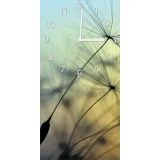 Wallario Design Wanduhr Samen der Pusteblume in Nahaufnahme vor blauem Himmel aus Echtglas, Größe 30 x 60 cm - Gelb
