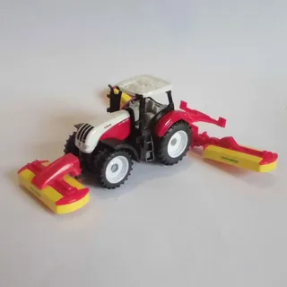 Siku 1672 - Steyr Traktor mit Pöttinger Mähwerkskombination Rot 1:72