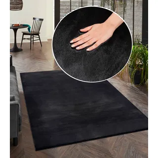 merinos Teppich »Focus 47« rechteckig 11 mm Höhe Fellteppich, weich und elegant, Wohnzimmer, Schlafzimmer, schwarz