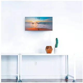 ARTland Wanduhr Sonnenuntergang und das Meer Größe: 60x30 cm - blau