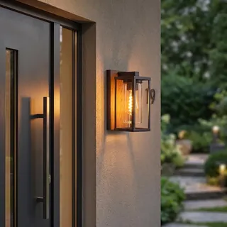HOFSTEIN Außenwandleuchte Portalis, Außenwandlampe aus Metall/Glas in Schwarz/Holzoptik/Klar, moderne Wandleuchte außen im Retro/Vintage-Design mit Lichteffekt, E27, IP44, Hof, Außenbereich, Haustür