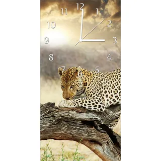 Wallario Design Wanduhr Leopard auf Baumstamm in Afrika aus Echtglas, Größe 30 x 60 cm - Gelb