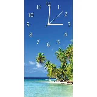Wallario Design Wanduhr Blauer Himmel weißer Strand Palmen und das tiefblaue Meer aus Echtglas, Größe 30 x 60 cm - Blau