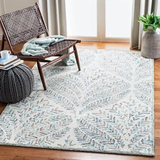 SAFAVIEH Modern Teppich für Wohnzimmer, Esszimmer, Schlafzimmer - Capri Collection, Kurzer Flor, Beige und Blau, 152 X 229 cm