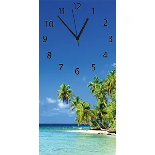 Wallario Design Wanduhr Blauer Himmel weißer Strand Palmen und das tiefblaue Meer aus Echtglas, Größe 30 x 60 cm - Blau