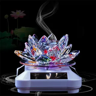 Glas Lotus Ornament mit Solar Spin System Light Illuminated Base White Hintergrund - farbenfroher Lotus