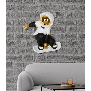 Gilde Wandobjekt Skateboard Astronaut aus Kunstharz, metallische Optik, schwarz/weiß, 45x39x14 cm