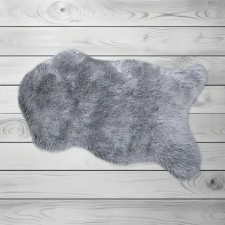 KiNZLER Fellteppich »Kunstfell« fellförmig 30 mm Höhe Uni-Farben, weich & flauschig, waschbar, ideal als Bettvorleger, silberfarben