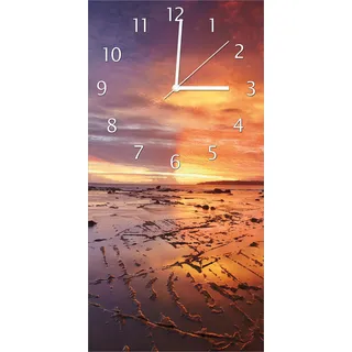Wallario Design Wanduhr Wattwanderung am Meer bei Sonnenuntergang aus Echtglas, Größe 30 x 60 cm - Rot