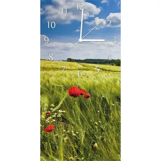 Wallario Design Wanduhr Mohnblumenwiese auf grüner Wiese unter blauem Himmel aus Echtglas, Größe 30 x 60 cm - Gelb
