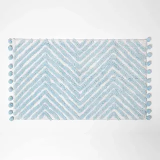 Homescapes Blaue Badematte Zickzack 50x80 cm, Badteppich getuftet, Chevron Badvorleger mit Bommeln